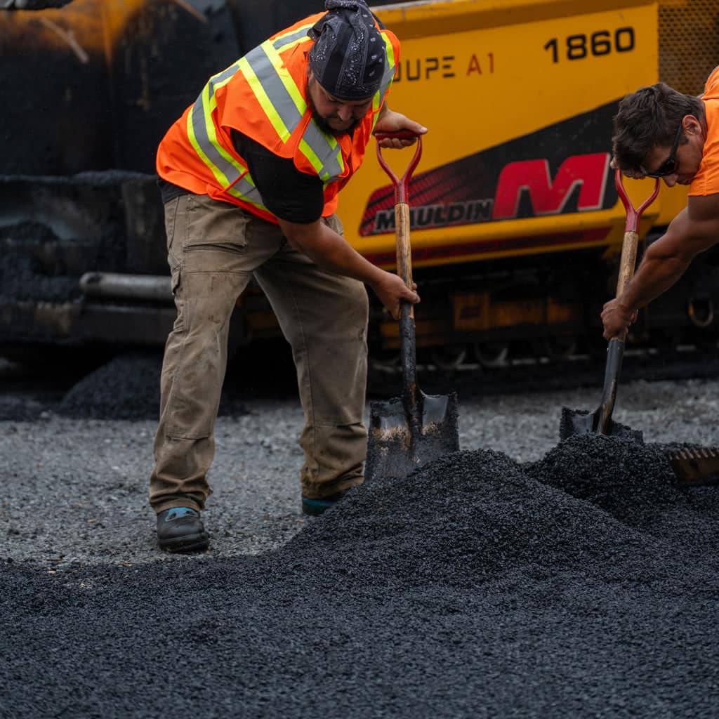 Groupe A1 crew repairing an asphalt surface