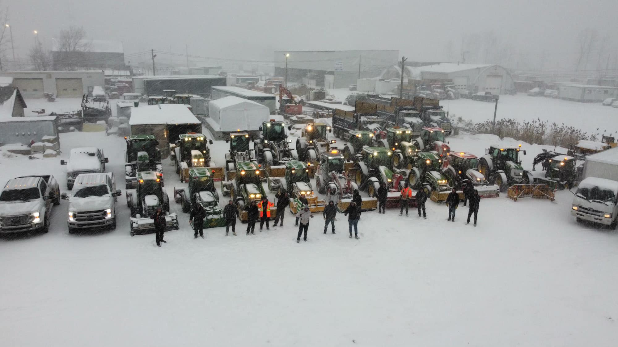 Groupe A1 snow removal fleet with the team