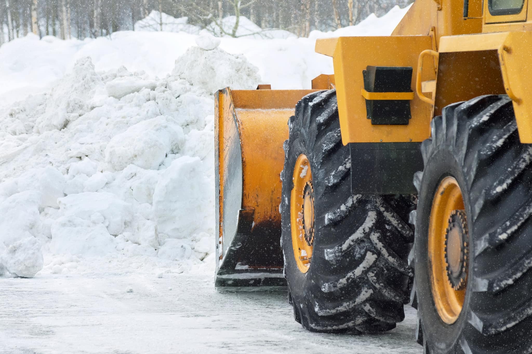 Commercial snow removal in progress